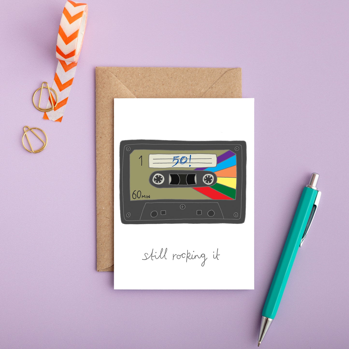 A retro 50th birthday card with an illustration of a cassette