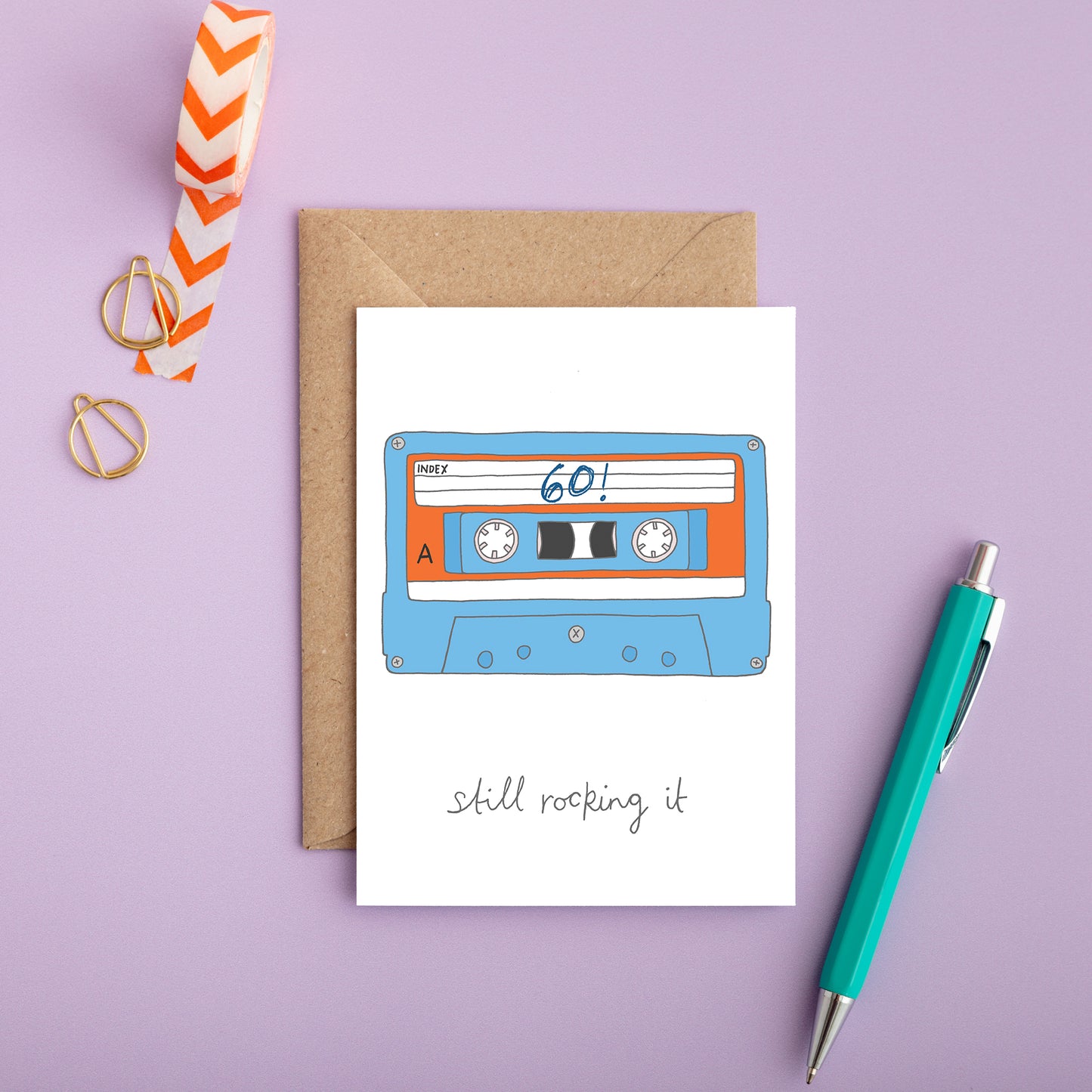 A retro 60th birthday card with an illustration of a cassette