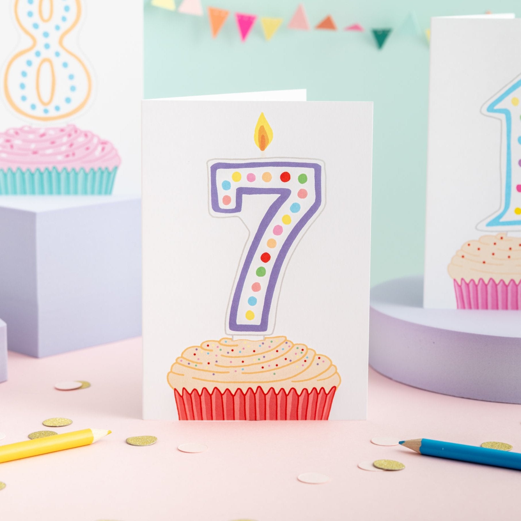 A 7th birthday card with a cupcake illustration