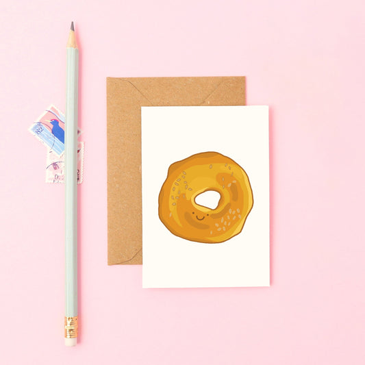 Mini Greeting Card Featuring a Smiley Bagel