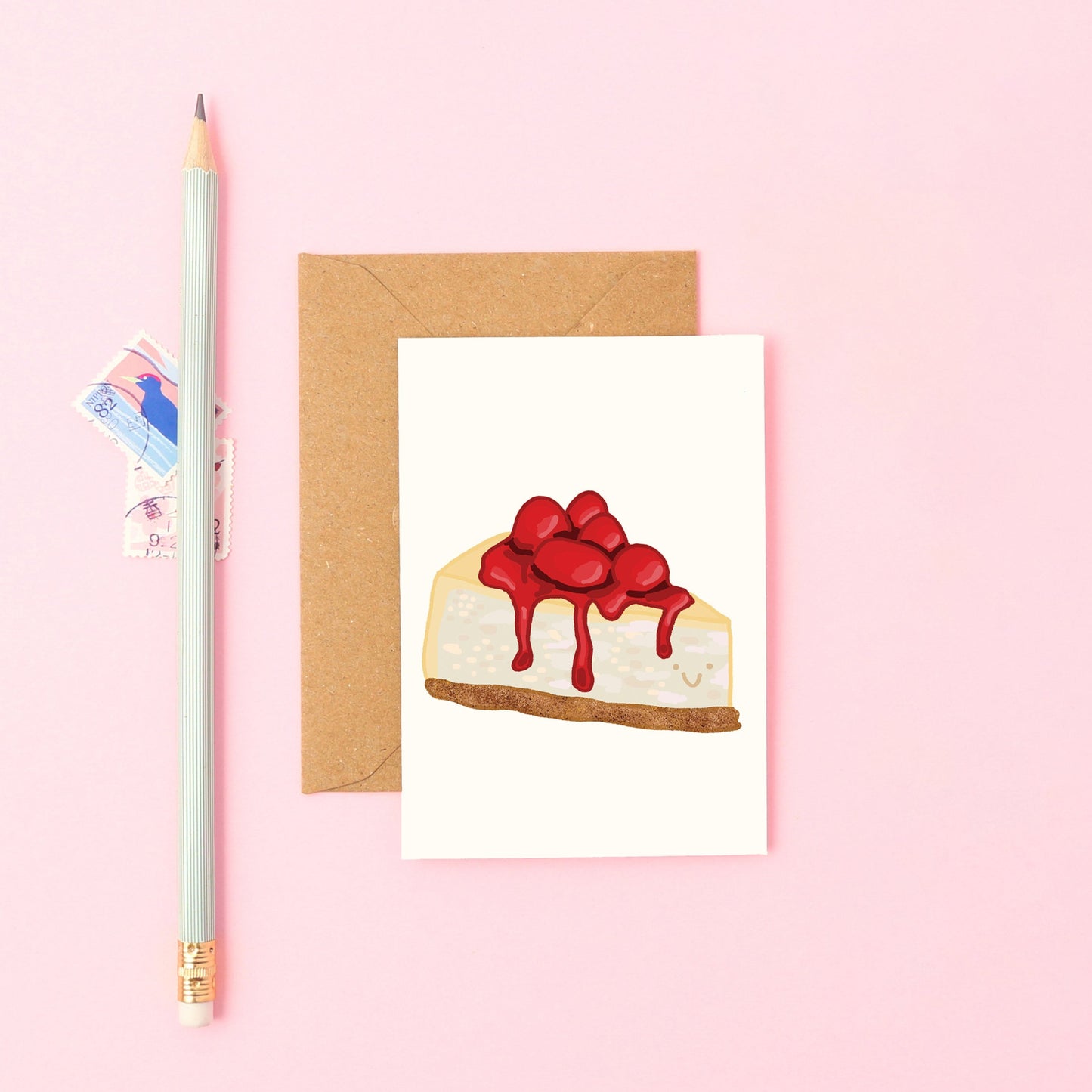 Mini Greeting Card Featuring a Smiley Cheesecake