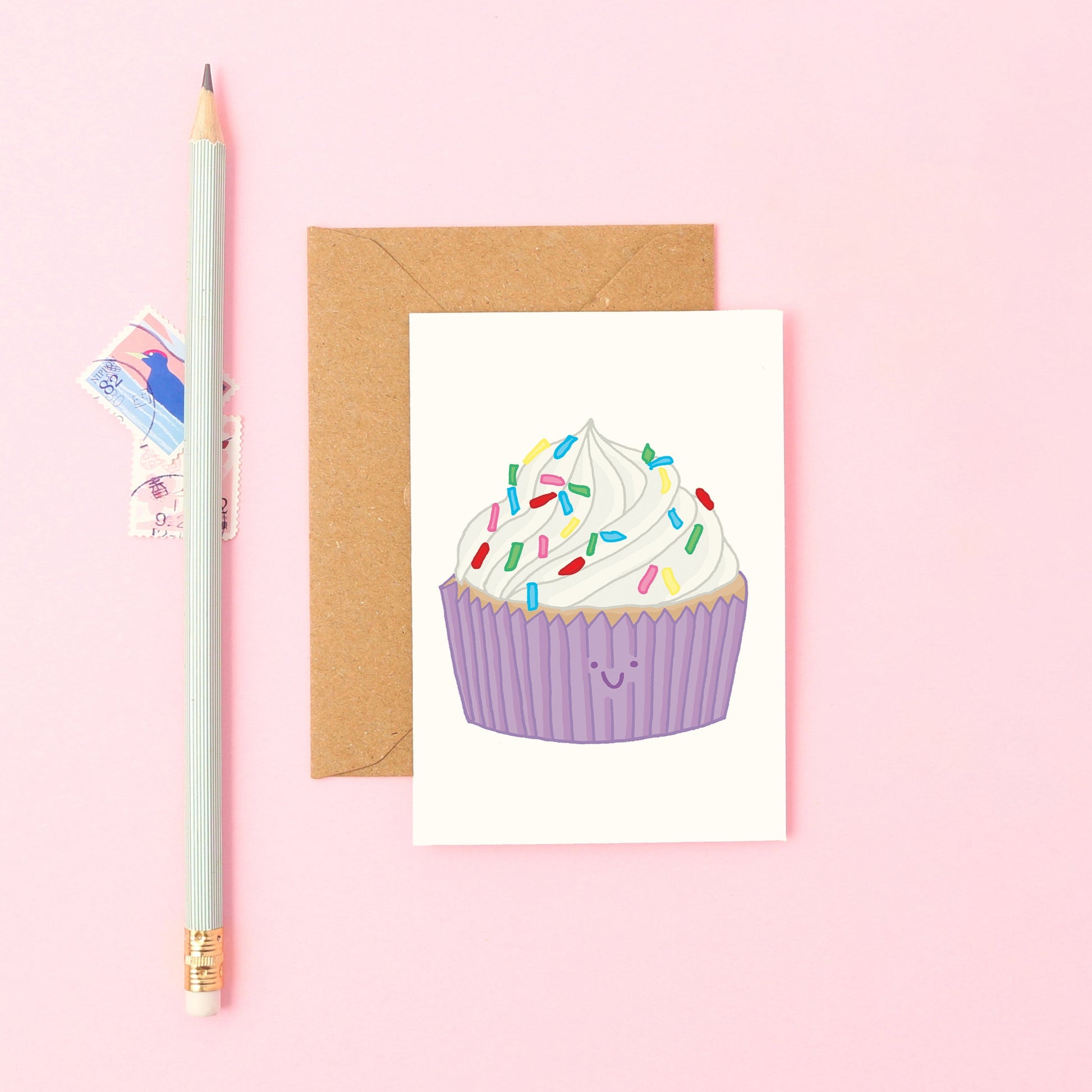 Cute Mini Greeting Card Featuring a Smiley Cupcake