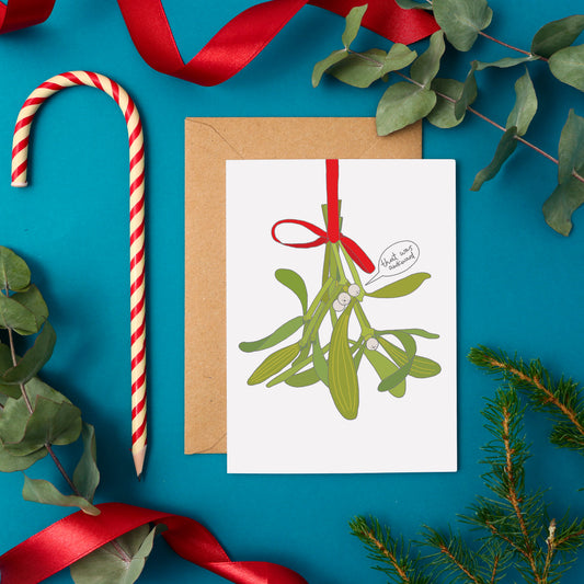A Funny Christmas Card Featuring a Bunch Of Mistletoe