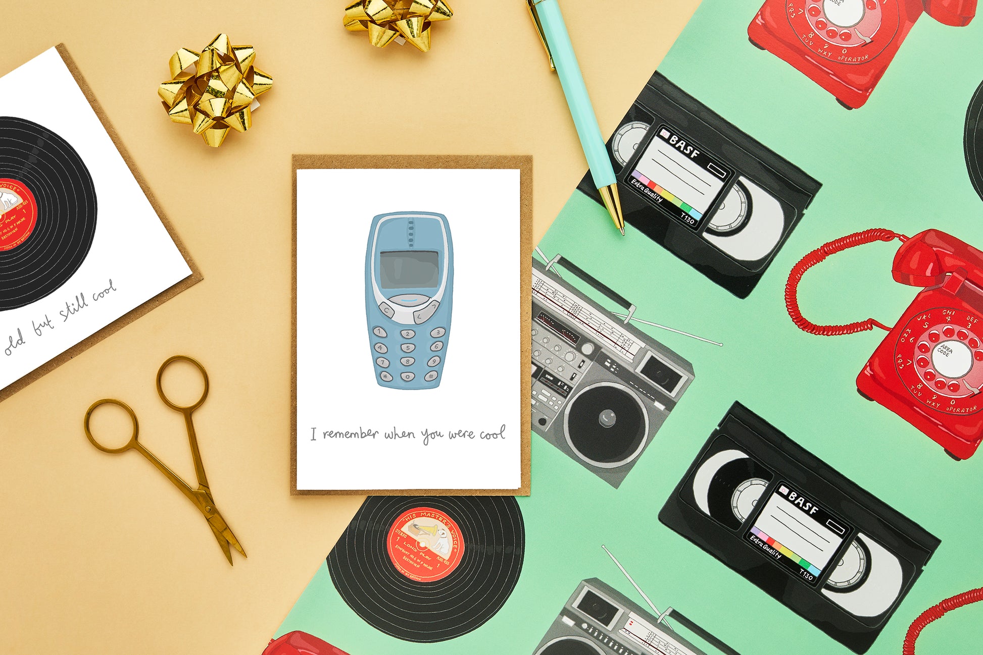 A retro birthday card with an illustration of a mobile phone and a record