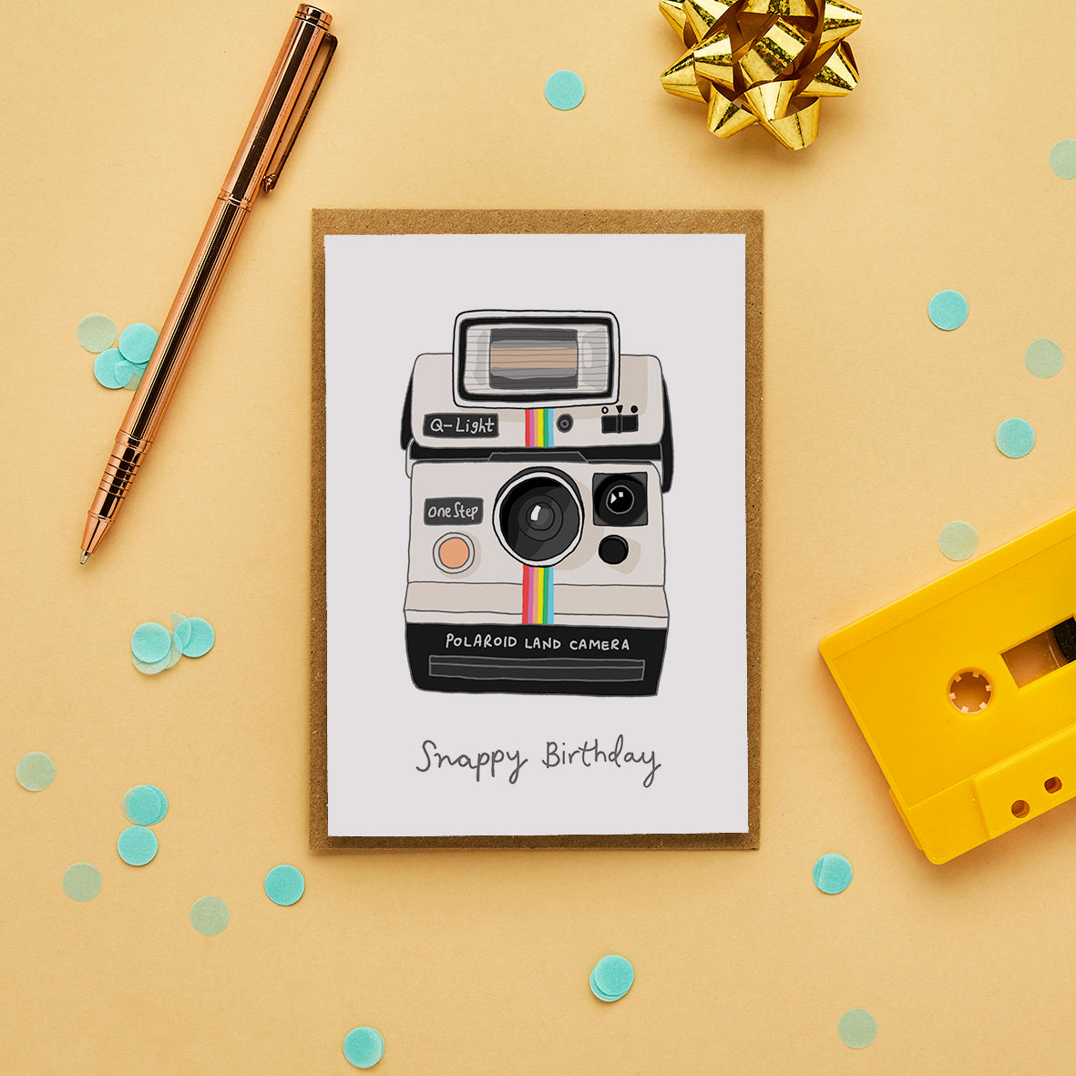 Hand drawn retro birthday card featuring a Polaroid camera with the caption “Snappy Birthday.”