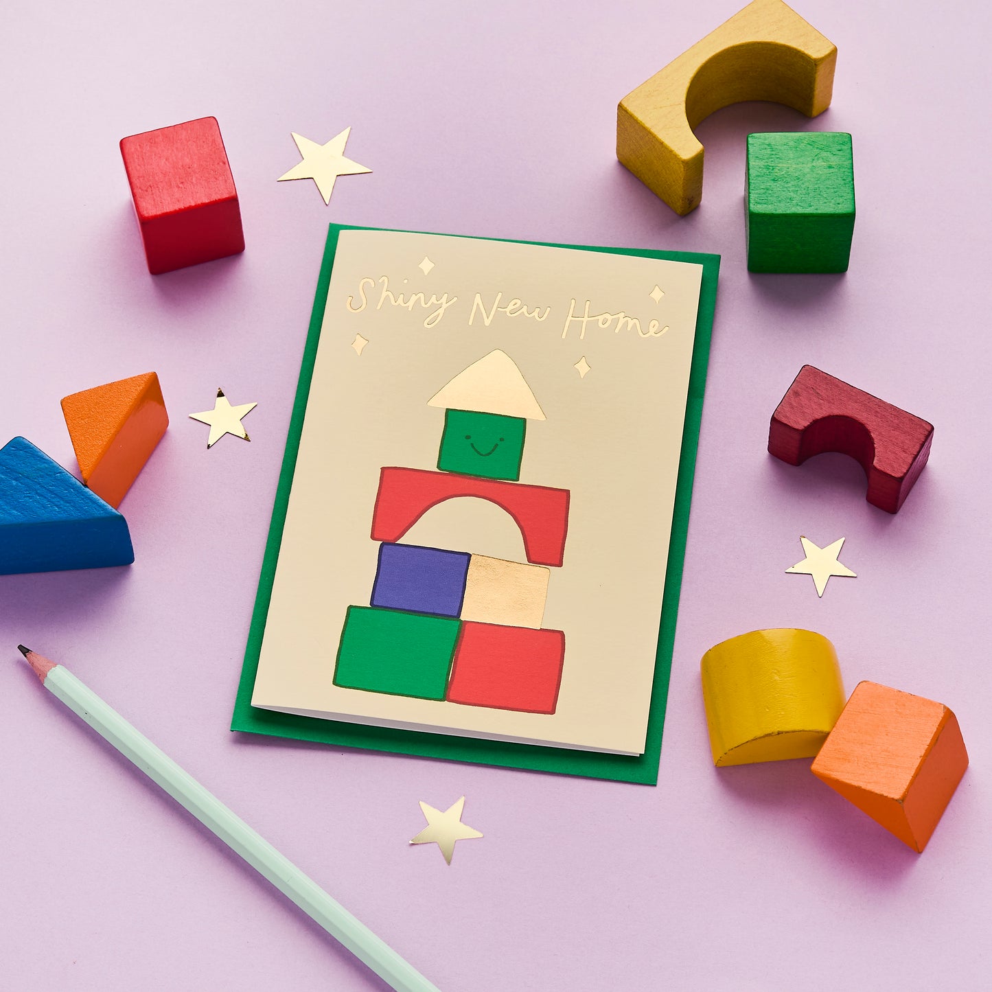 A Shiny New Home Card Featuring A Block Tower
