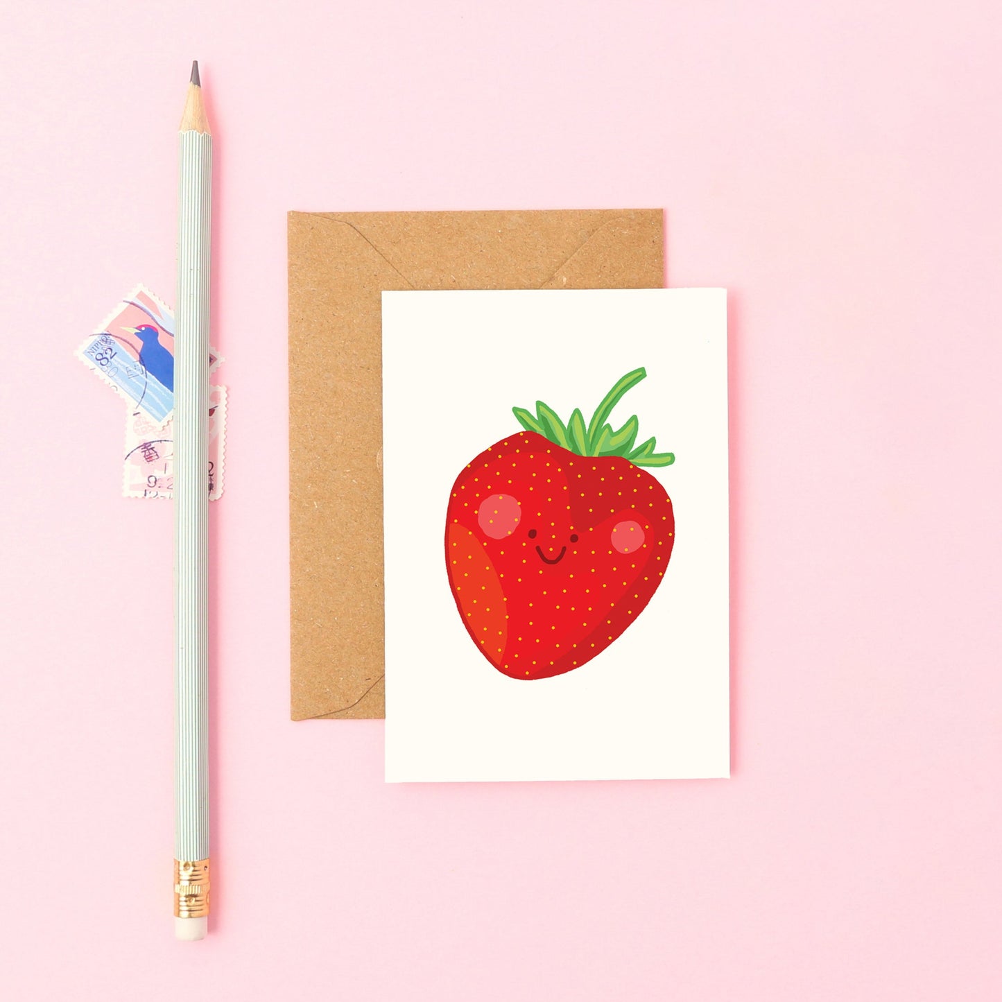 Cute Mini Greeting Card Featuring a Smiley Strawberry