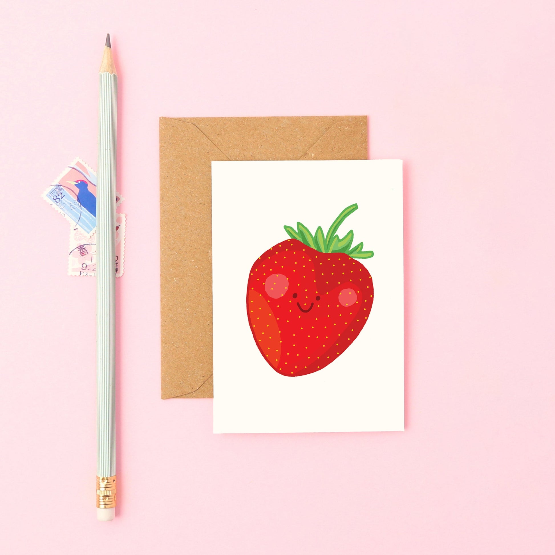 Cute Mini Greeting Card Featuring a Smiley Strawberry