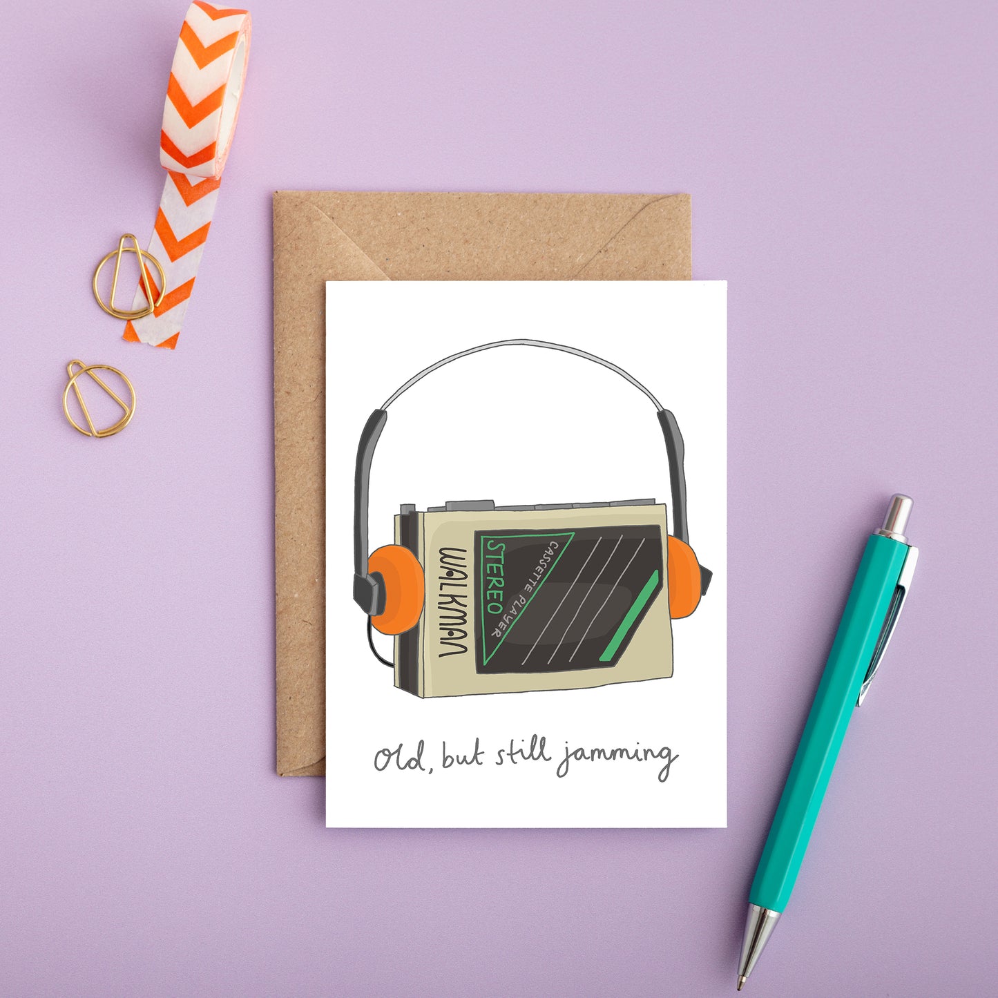 Illustrated retro Walkman birthday card with headphones and handwritten message “Old, but still jamming.”
