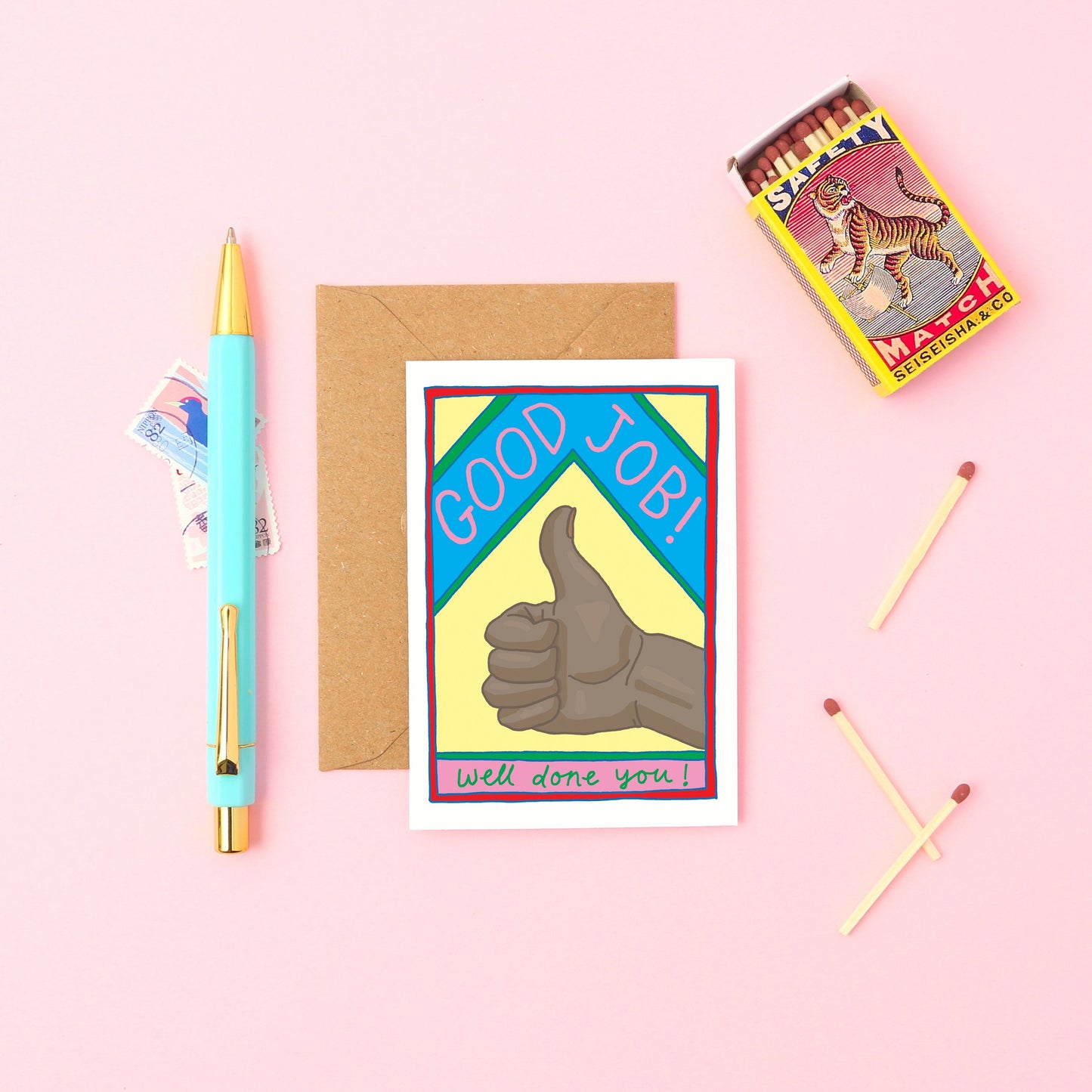 This mini card features a brown thumbs up