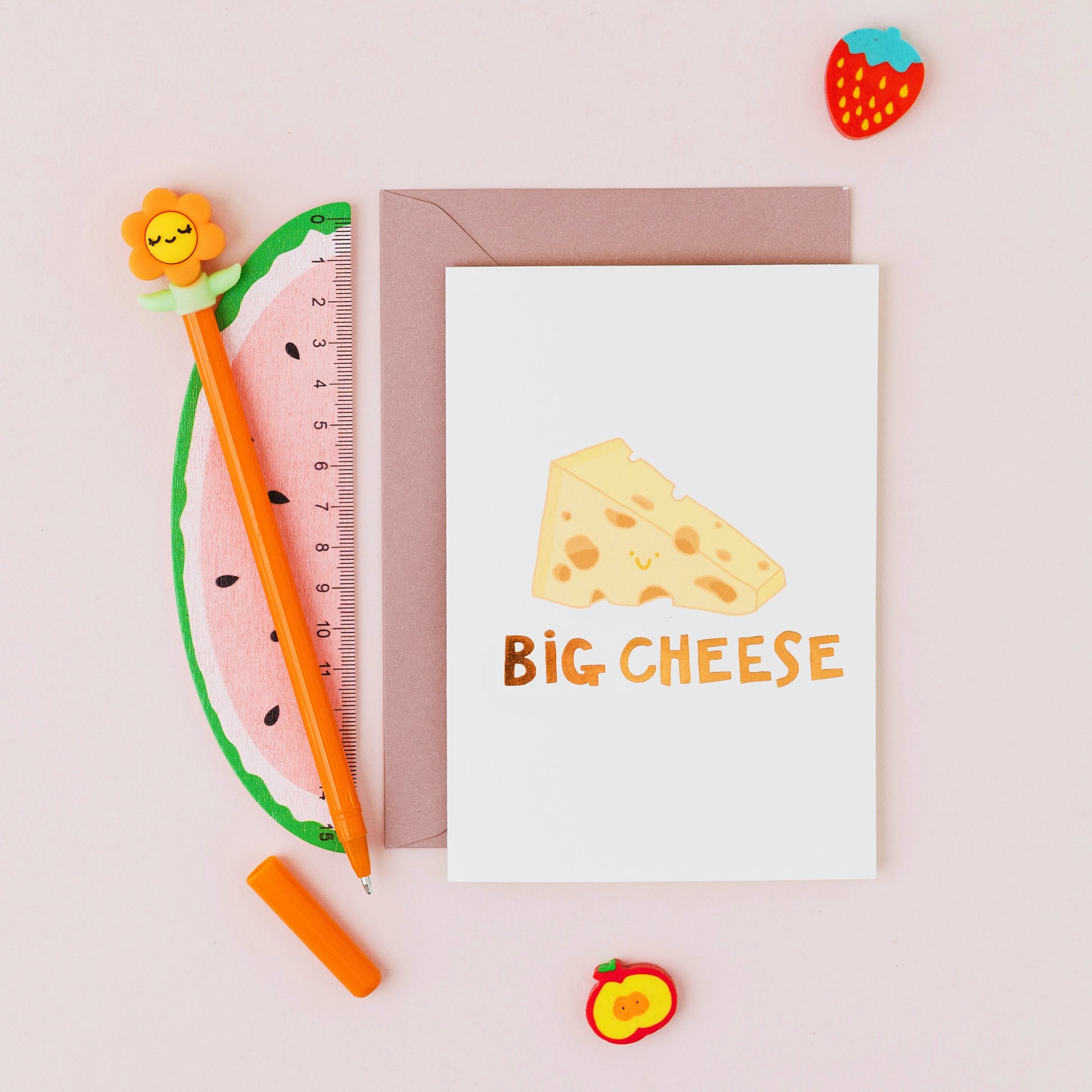 Big Cheese greeting card featuring a smiling wedge of cheese with gold foil lettering on a contemporary white background.
