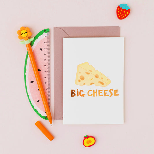 Big Cheese greeting card featuring a smiling wedge of cheese with gold foil lettering on a contemporary white background.
