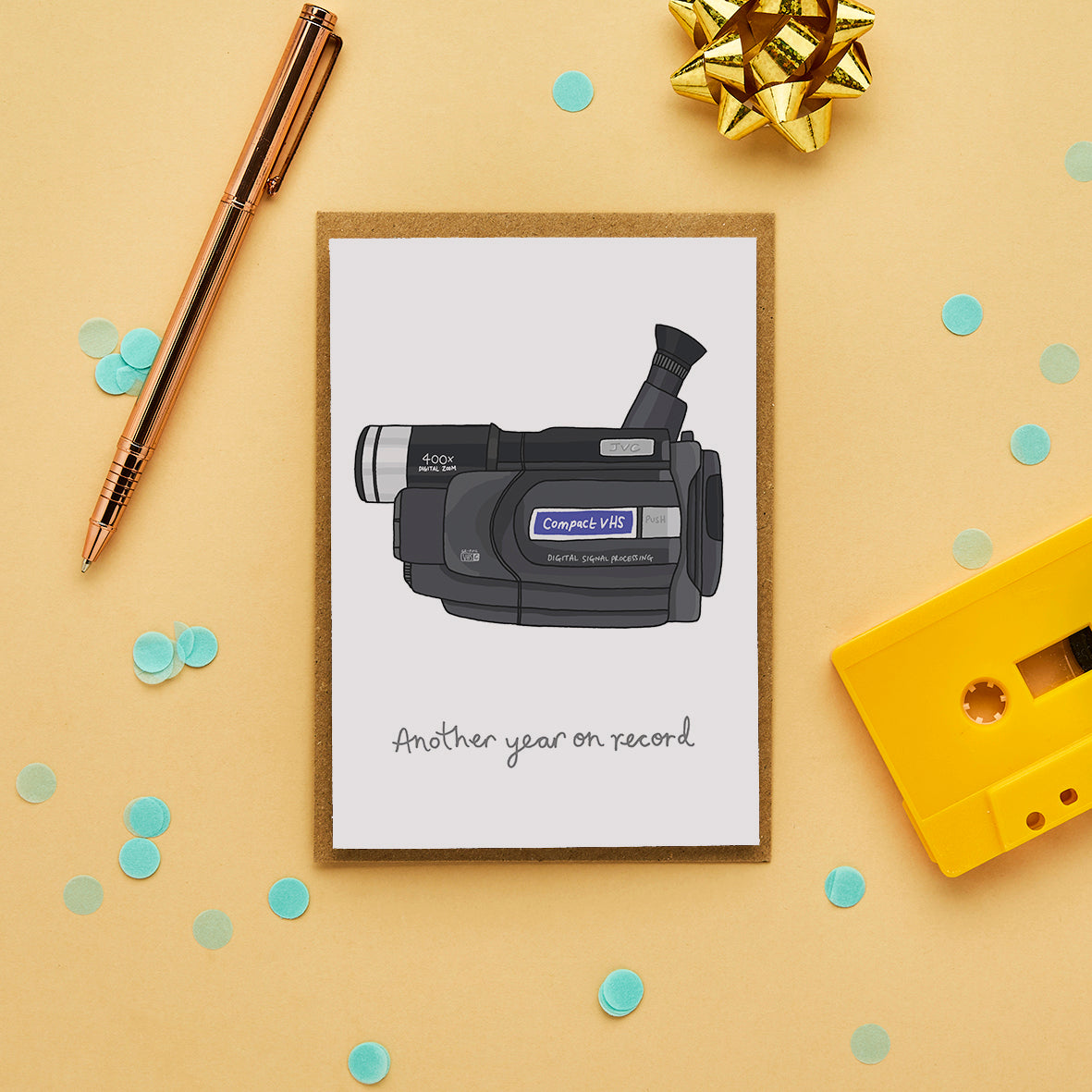 Retro birthday card with hand drawn camcorder and caption “Another year on record.”
