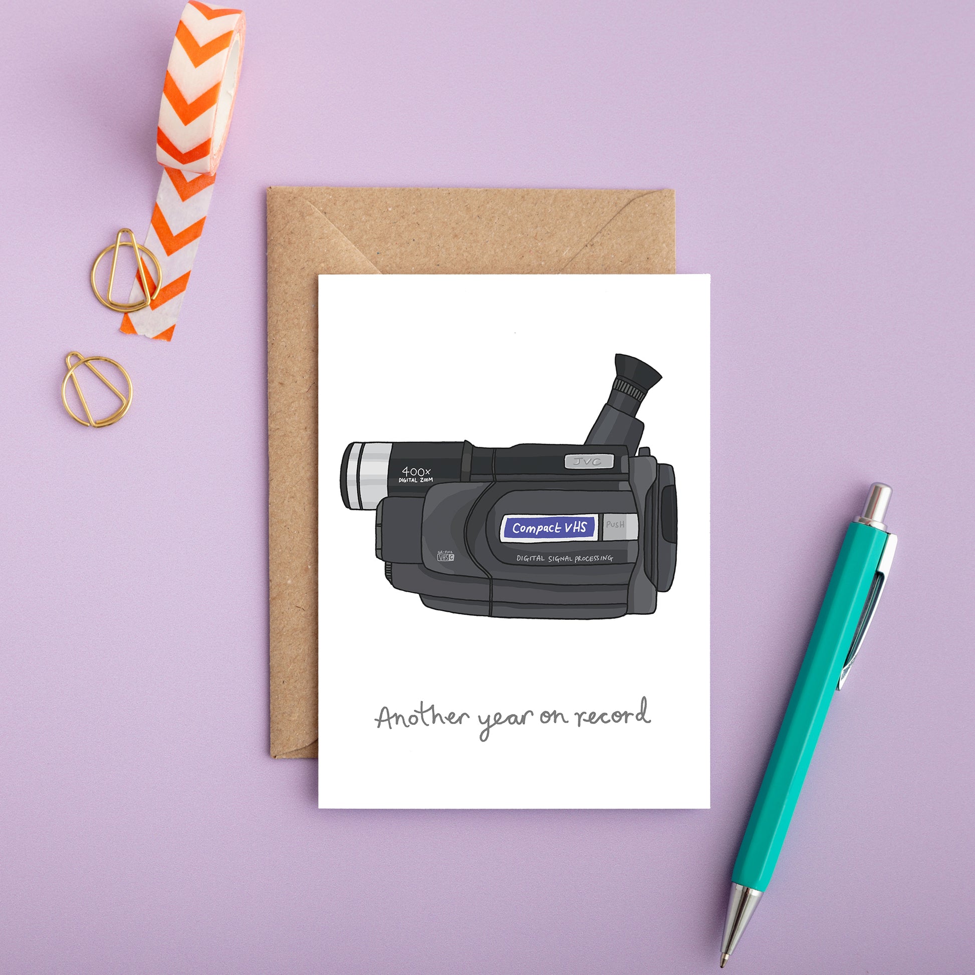 Retro birthday card with hand drawn camcorder and caption “Another year on record.”
