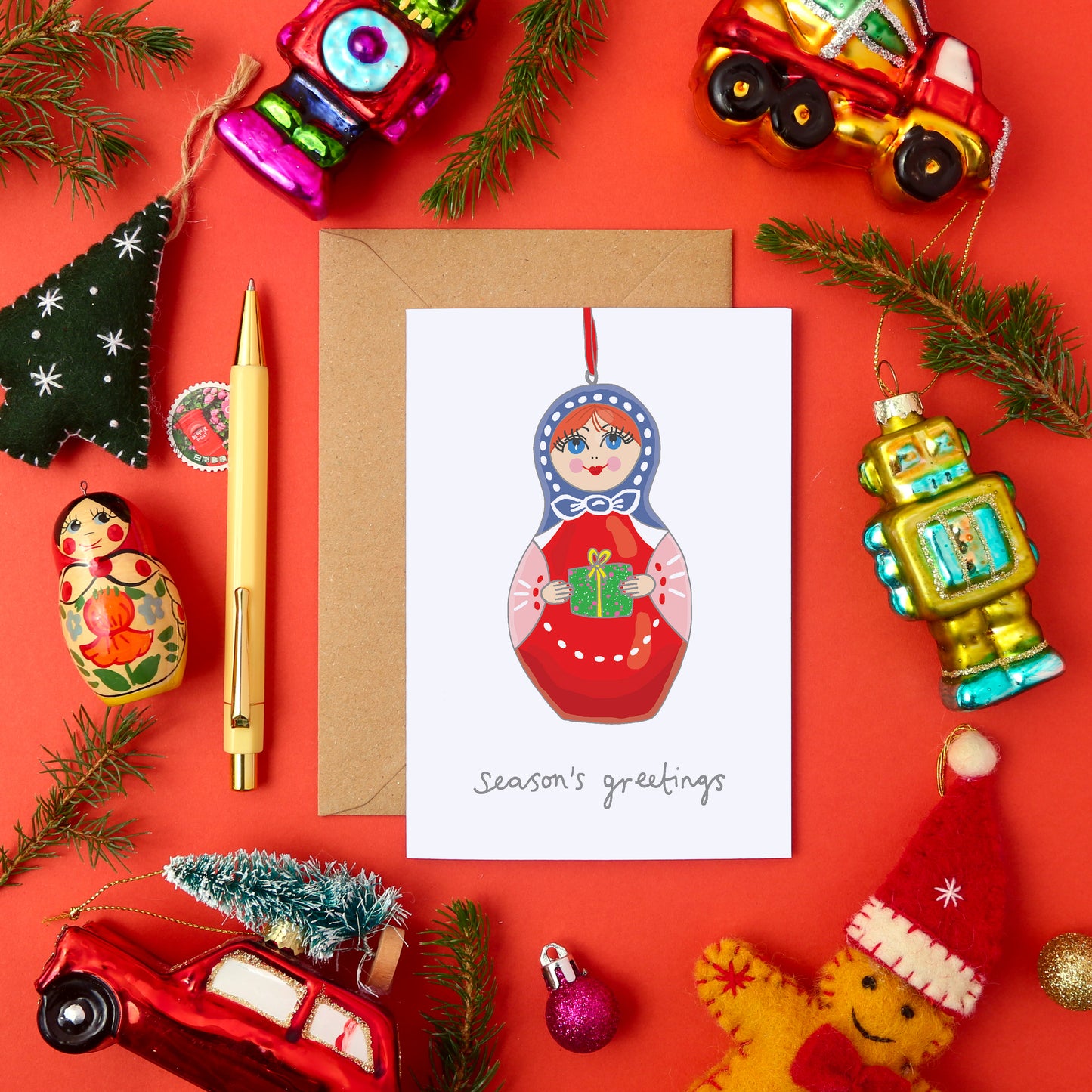 A Festive Christmas Card Featuring a Matryoshka Tree Decoration