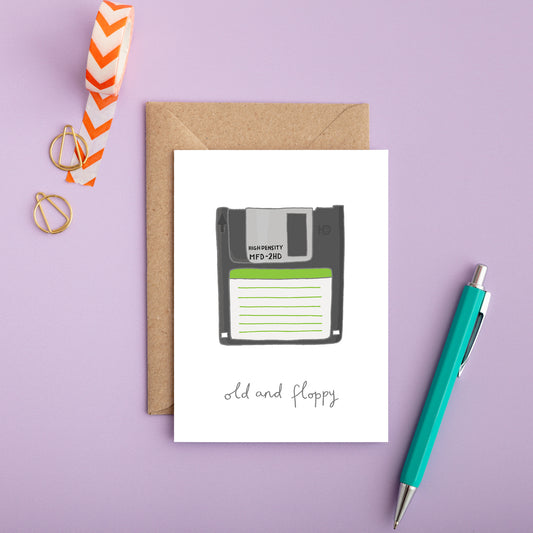 A retro birthday card with an illustration of a floppy disc