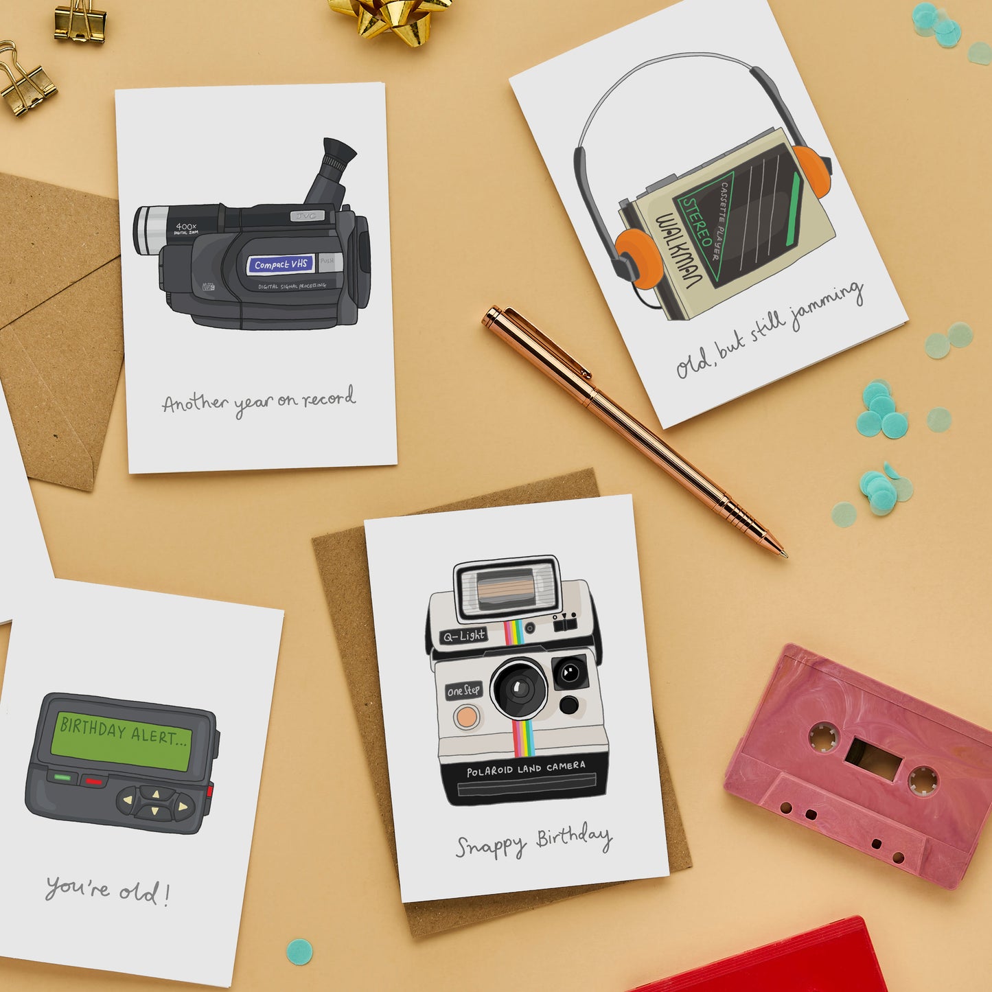 set of hand drawn retro birthday greeting cards featuring camcorder, walkman, pager or polaroid camera.