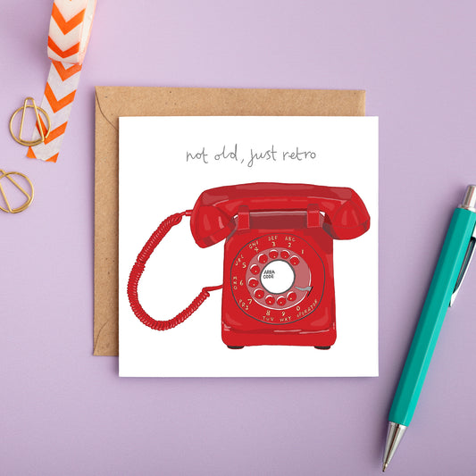 A retro birthday card with an illustration of a rotary phone