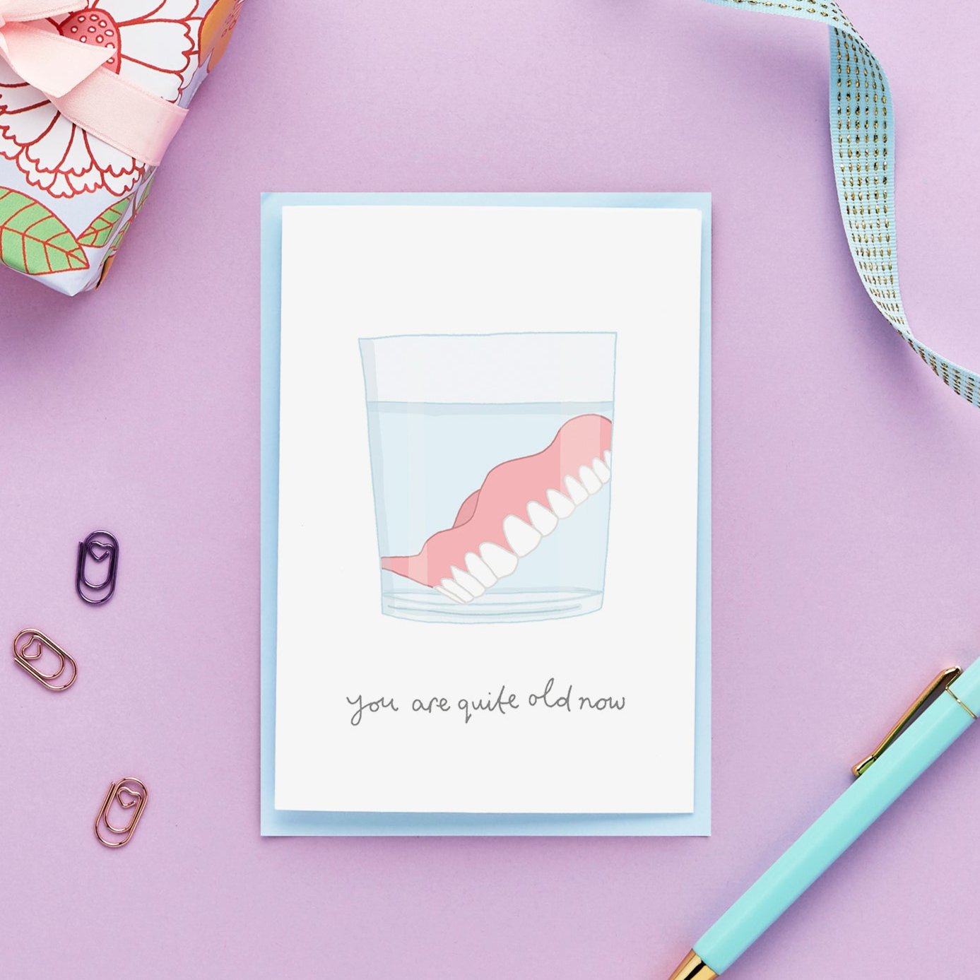 A Funny Birthday Card Featuring an Illustration of Fake Teeth