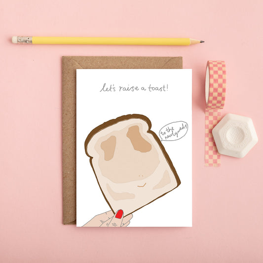 A Raise A Toast Wedding Card from You've Got Pen on Your Face.