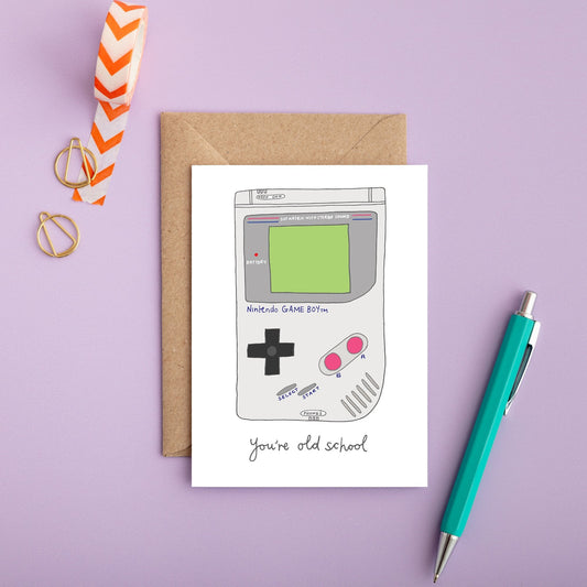 A retro birthday card with an illustration of a game boy