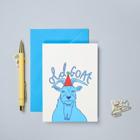 This hand drawn birthday card features a colourful illustration of a goat.