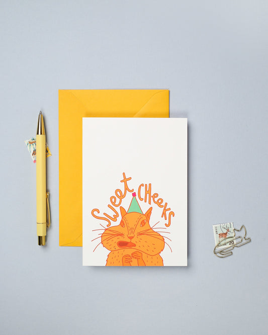This hand drawn birthday card features a colourful illustration of a chipmunk.